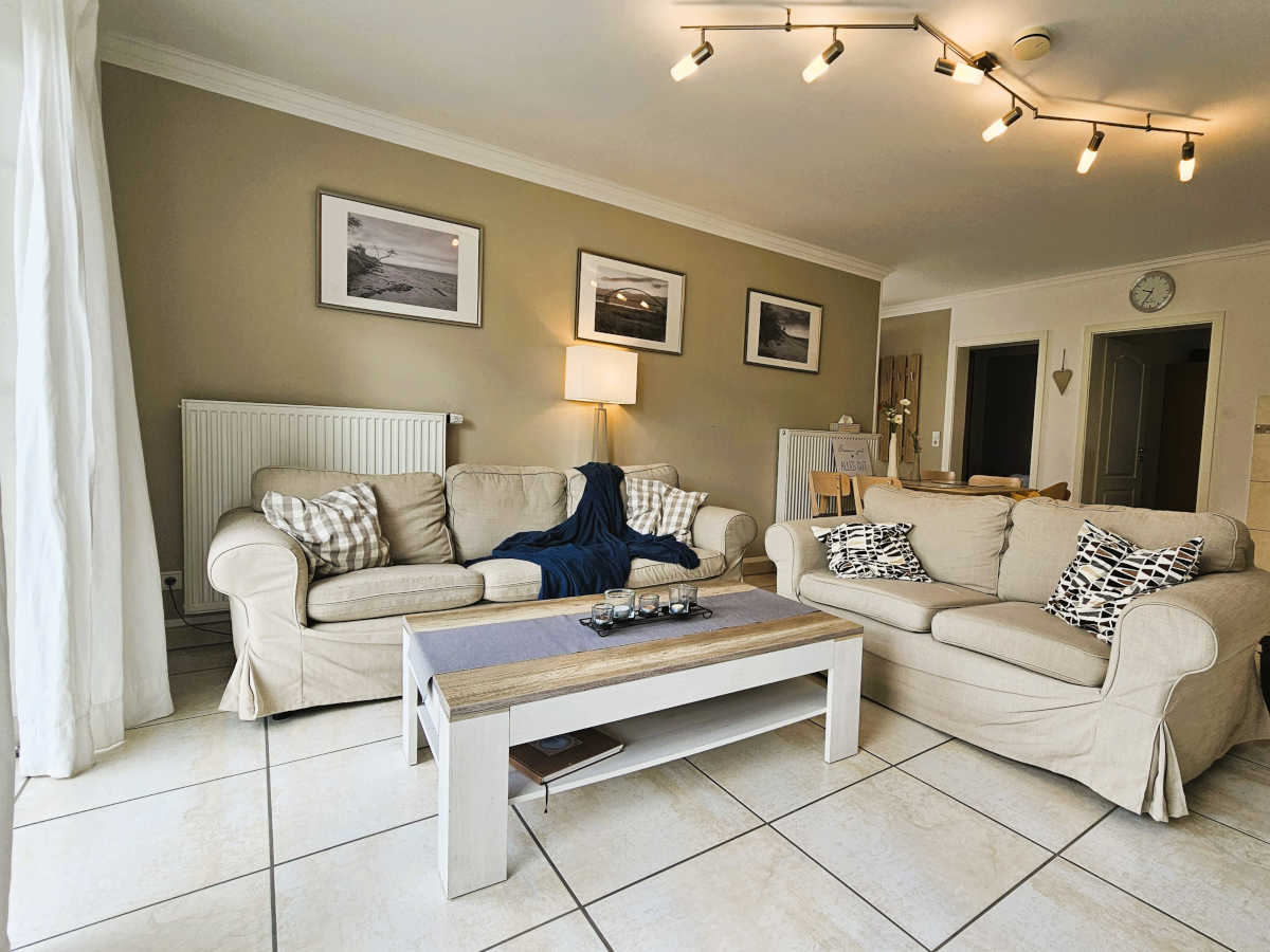 Wohnbereich mit Sofalandschaft, Ferienwohnung Burg Fehmarn